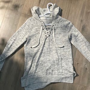 Grey long sleeve with tie up lacing at the neck